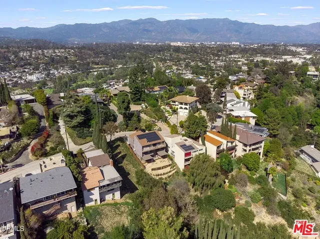 a view of city and mountain