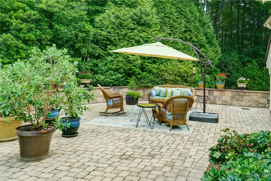 717 Old Stream Road Manakin-Sabot, VA 23103 - Photo 44 of 50 Left side patio and garage area