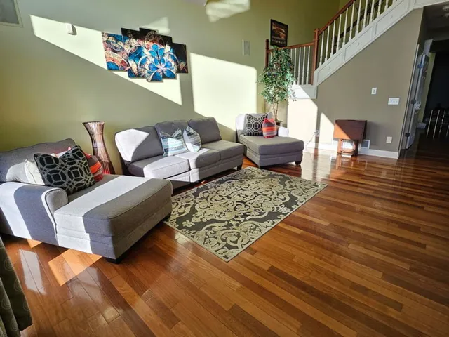 a kitchen with granite countertop a stove sink and cabinets
