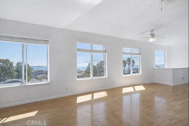 a kitchen that has a table and chairs in it