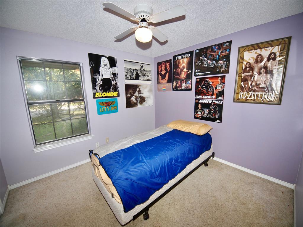 3106 South Lipsey Street Decatur, TX 76234 - Photo 13 of 27 a living room with furniture and window