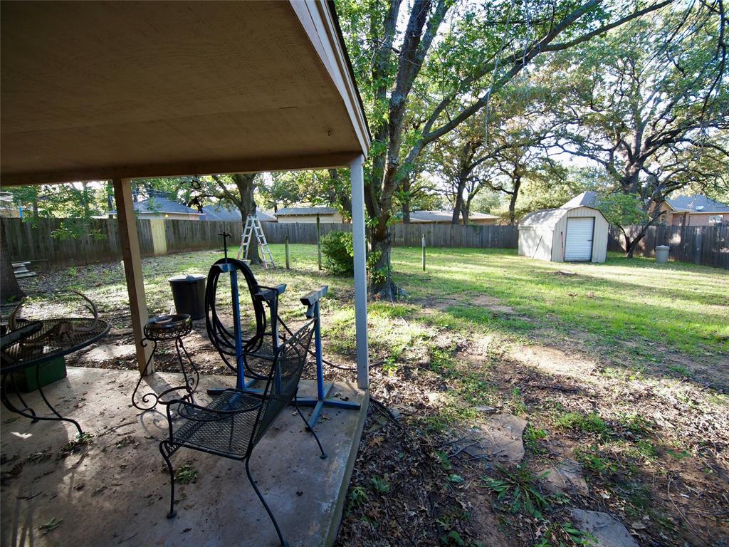 3106 South Lipsey Street Decatur, TX 76234 - Photo 20 of 27 a view of a porch with furniture and yard