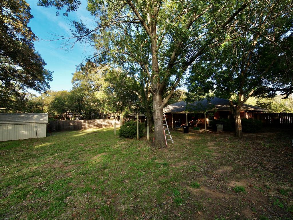 3106 South Lipsey Street Decatur, TX 76234 - Photo 25 of 27 a view of a trees in a yard