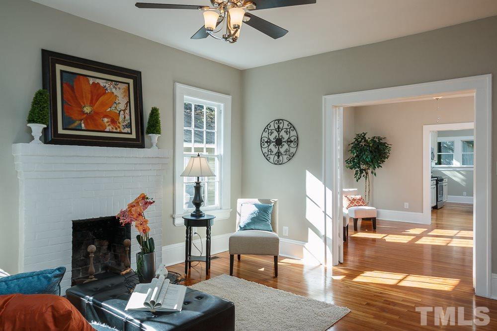 605 North East Street Raleigh, NC 27604 - Photo 3 of 25 a living room with furniture and a fireplace