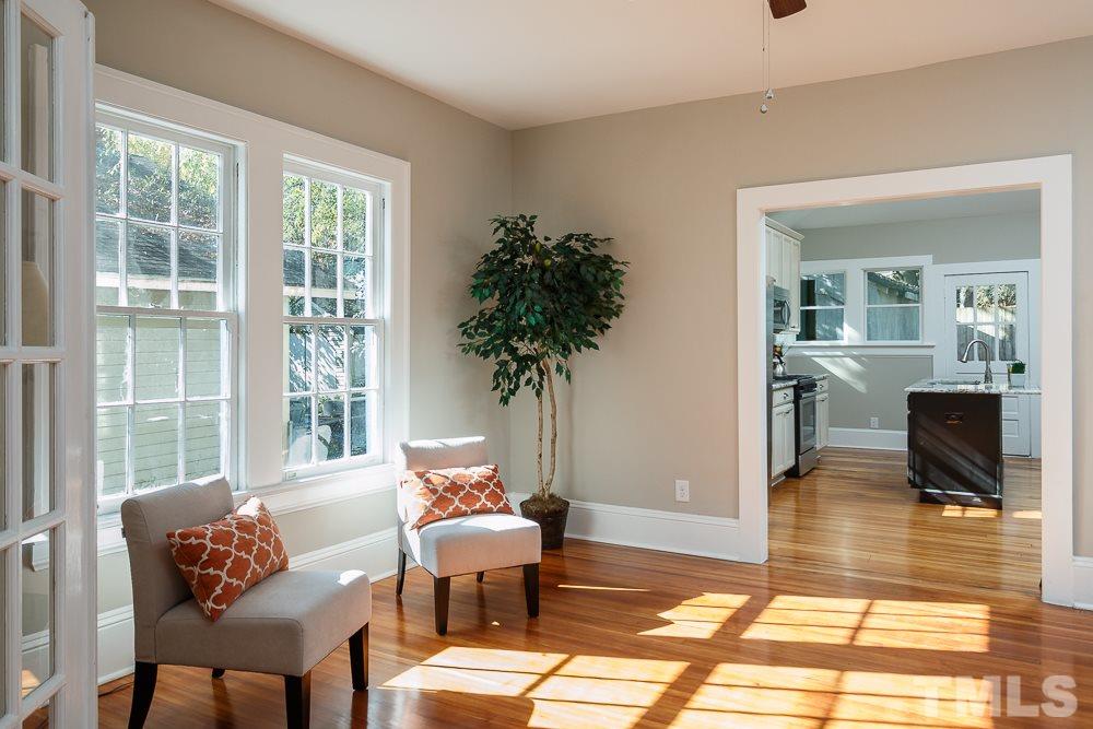 605 North East Street Raleigh, NC 27604 - Photo 5 of 25 a living room with furniture and a potted plant