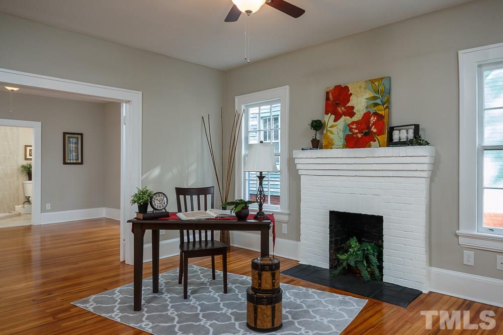 605 North East Street Raleigh, NC 27604 - Photo 10 of 25 a living room with furniture and a fireplace