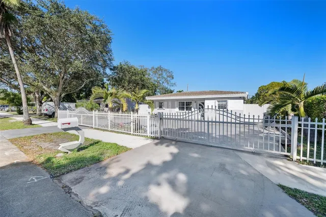 a view of a backyard with a small cabin