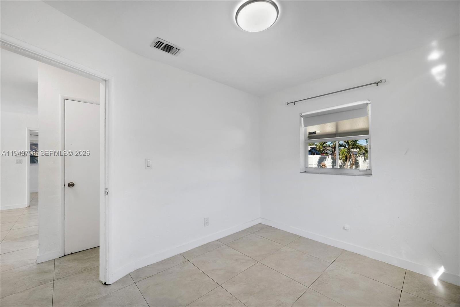 6231 Mayo Street Hollywood, FL 33023 - Photo 17 of 34 a view of an empty room