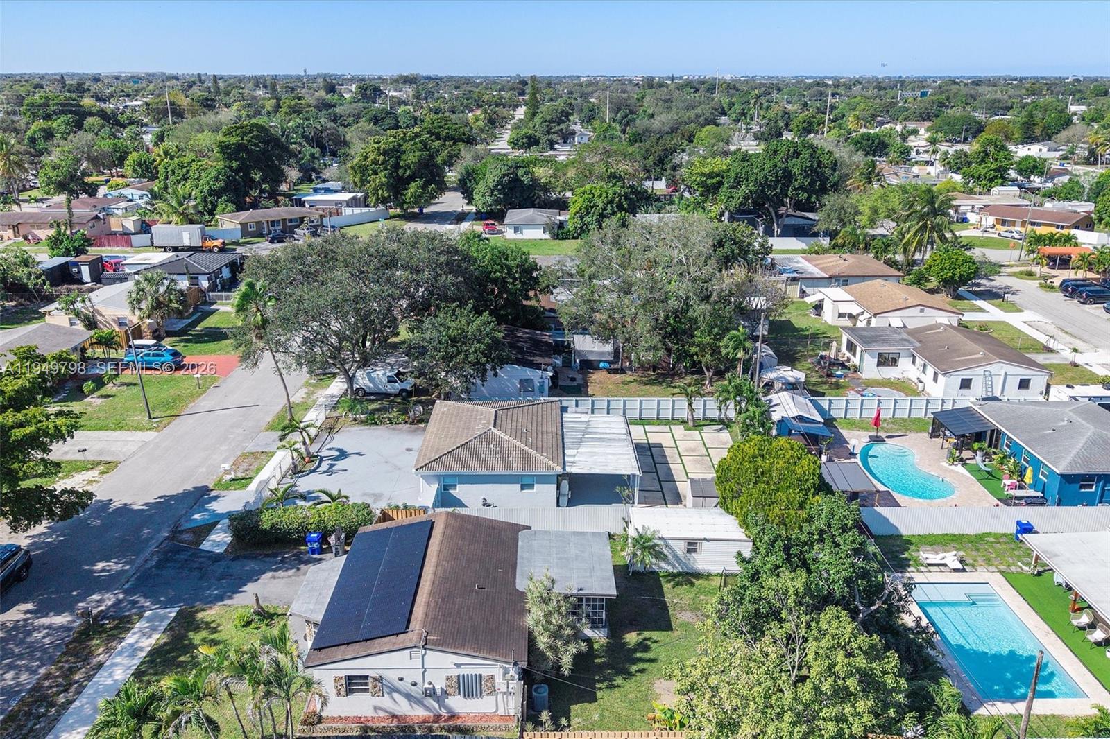6231 Mayo Street Hollywood, FL 33023 - Photo 22 of 34 an aerial view of multiple house