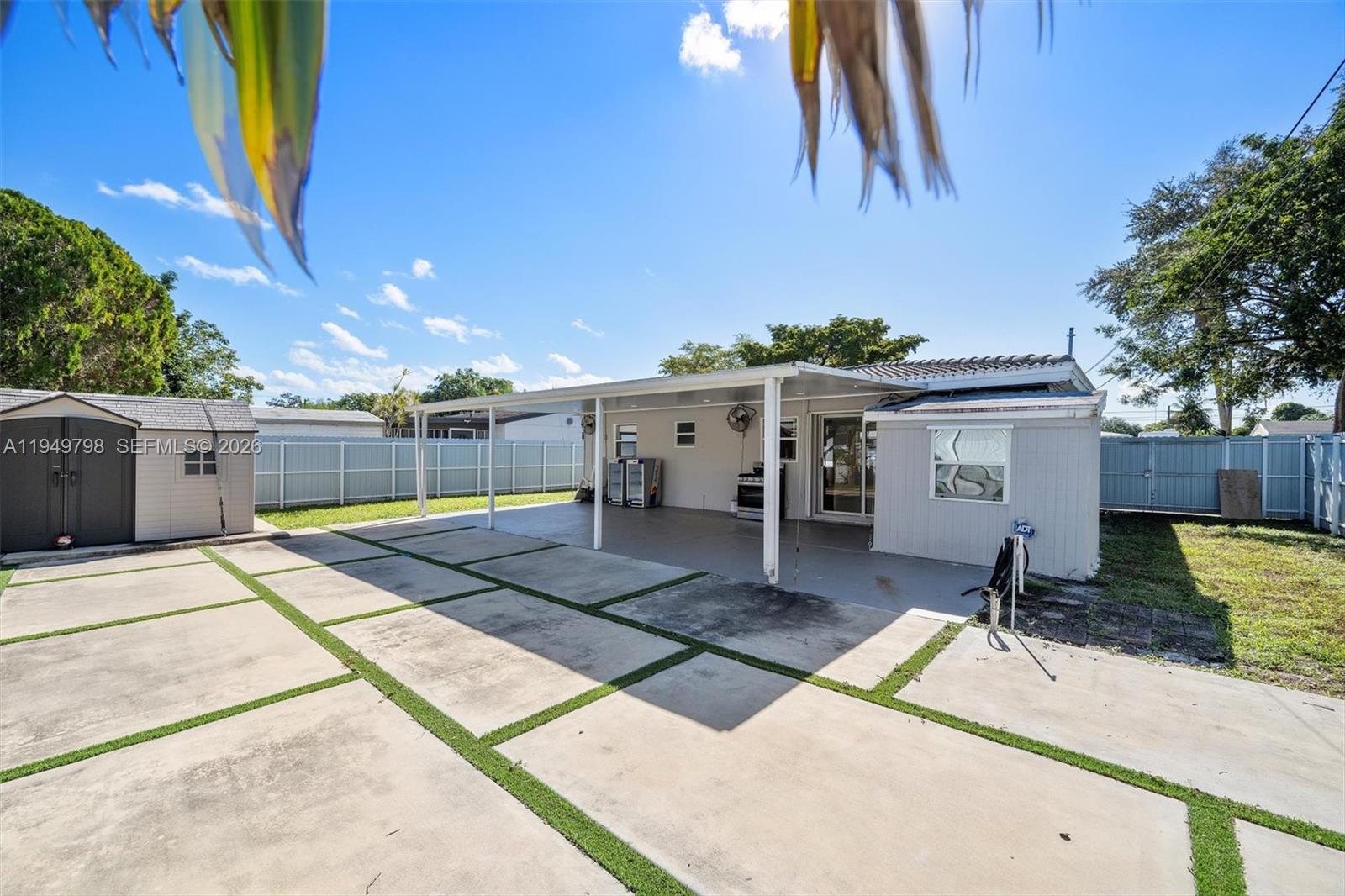 6231 Mayo Street Hollywood, FL 33023 - Photo 34 of 34 a view of a house with a patio