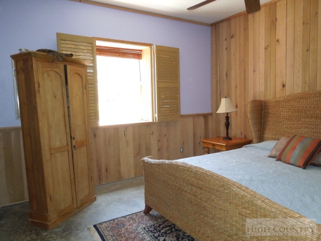 3086 Summit Road Purlear, NC 28665 - Photo 10 of 13 a bedroom with a bed and a window