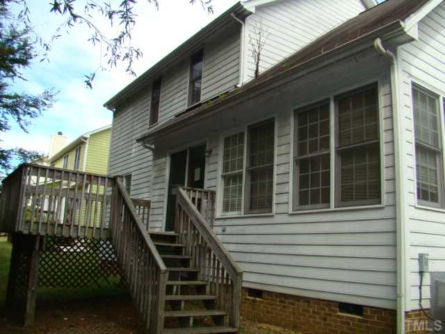6012 Eaglesfield Drive Raleigh, NC 27613 - Photo 2 of 9 a view of wooden house with a large windows