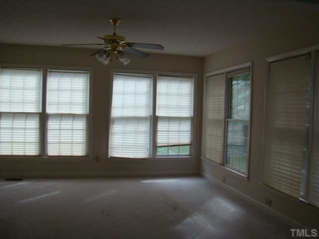 6012 Eaglesfield Drive Raleigh, NC 27613 - Photo 4 of 9 a view of an empty room with a window