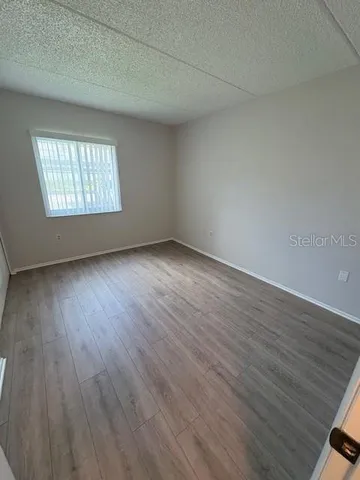 a view of a lake with a yard