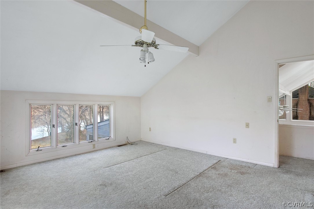 4221 Old Gun Road East Midlothian, VA 23113 - Photo 36 of 44 an empty room with windows and chandelier fan