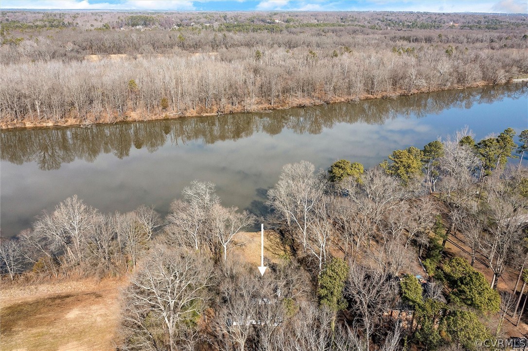 4221 Old Gun Road East Midlothian, VA 23113 - Photo 6 of 44 a view of a lake with a mountain and trees in the back