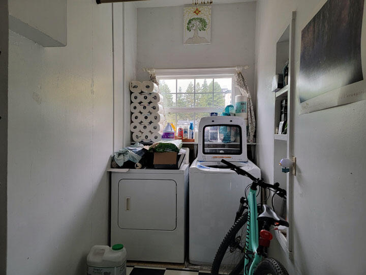 120 13th Street Arcata, CA 95521 - Photo 32 of 37 a utility room with dryer washer and a window