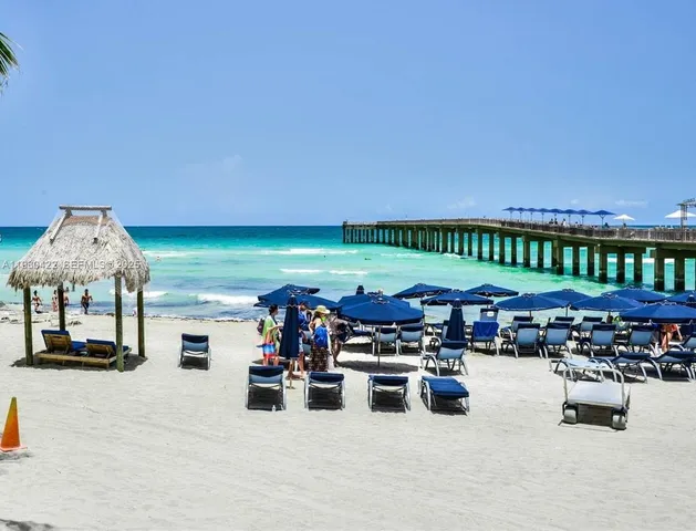 a view of a chairs and table in a patio