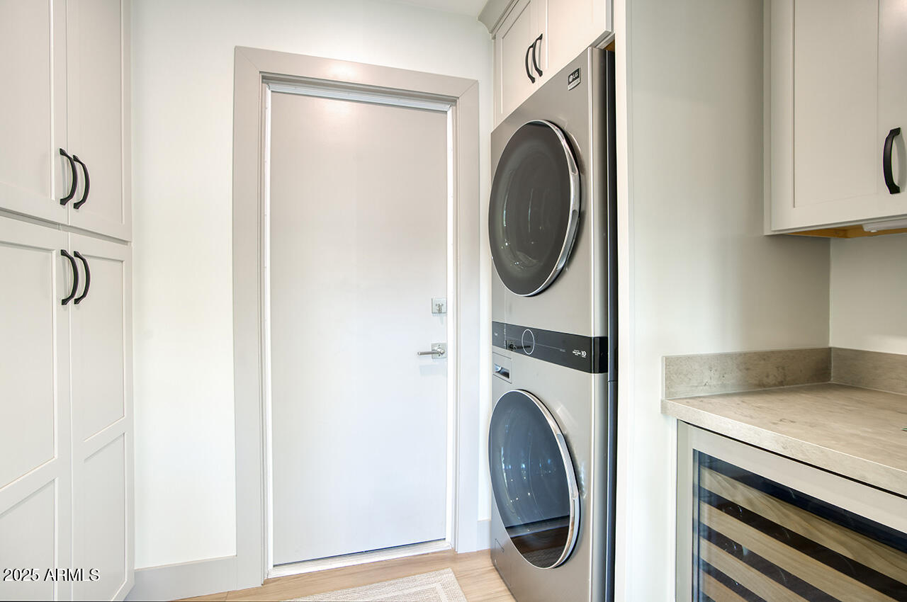 3337 East Las Rocas Drive Phoenix, AZ 85028 - Photo 13 of 22 a utility room with dryer and washer