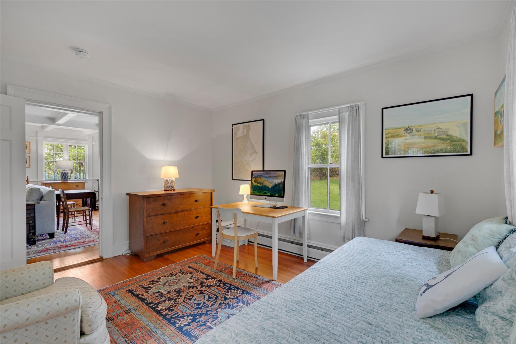 21 Quaker Road East Sandwich, MA 02537 - Photo 16 of 43 a bedroom with a bed and furniture