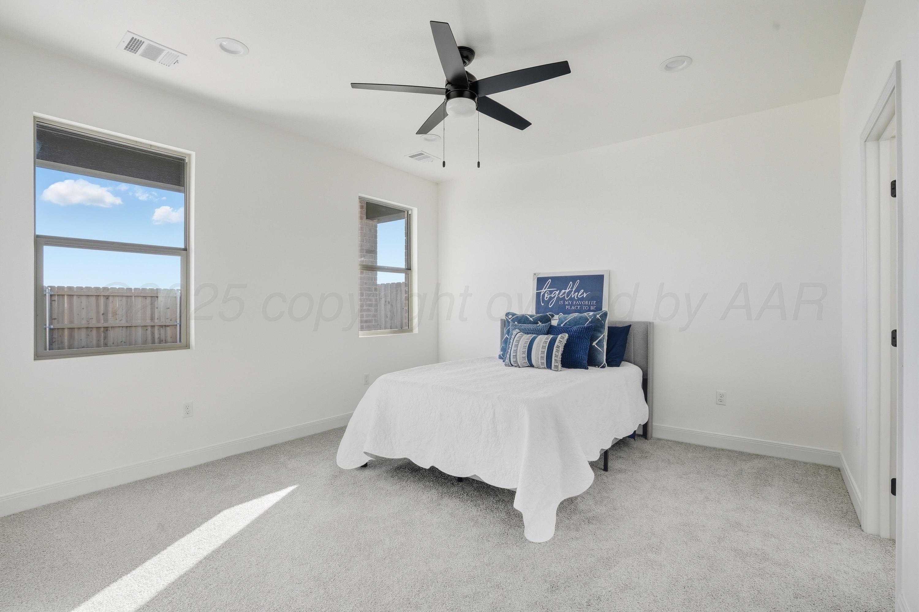 8 Gagestone Drive Canyon, TX 79015 - Photo 3 of 11 a bedroom with a bed and window