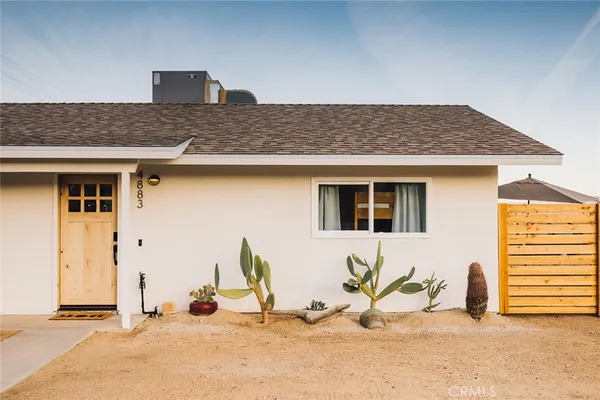 a view of a house with a patio