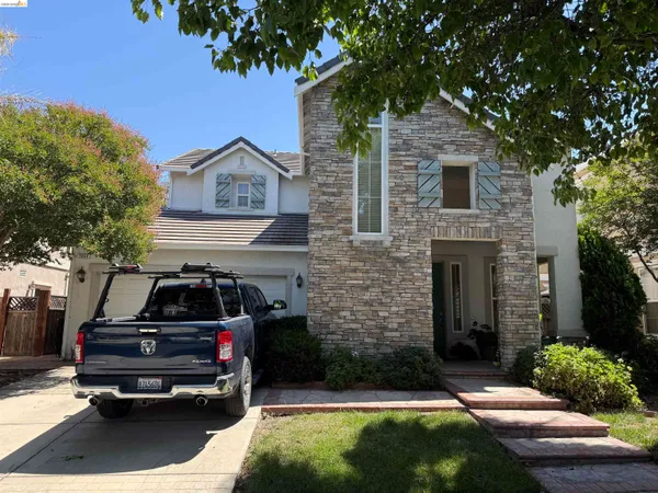 a car parked in front of a house