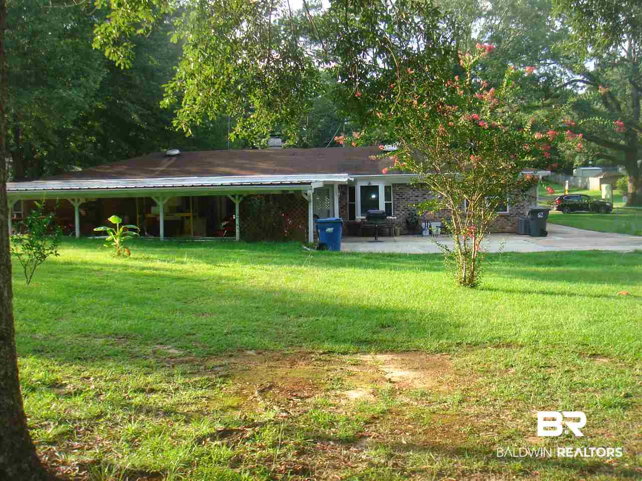 8305 Barrie Drive Theodore, AL 36582 - Photo 17 of 20 House has a porch and a carport