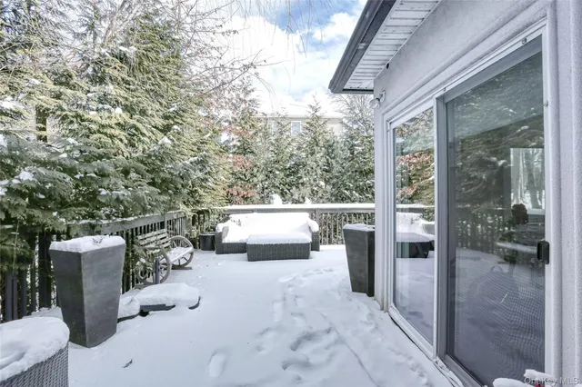 a view of balcony with furniture
