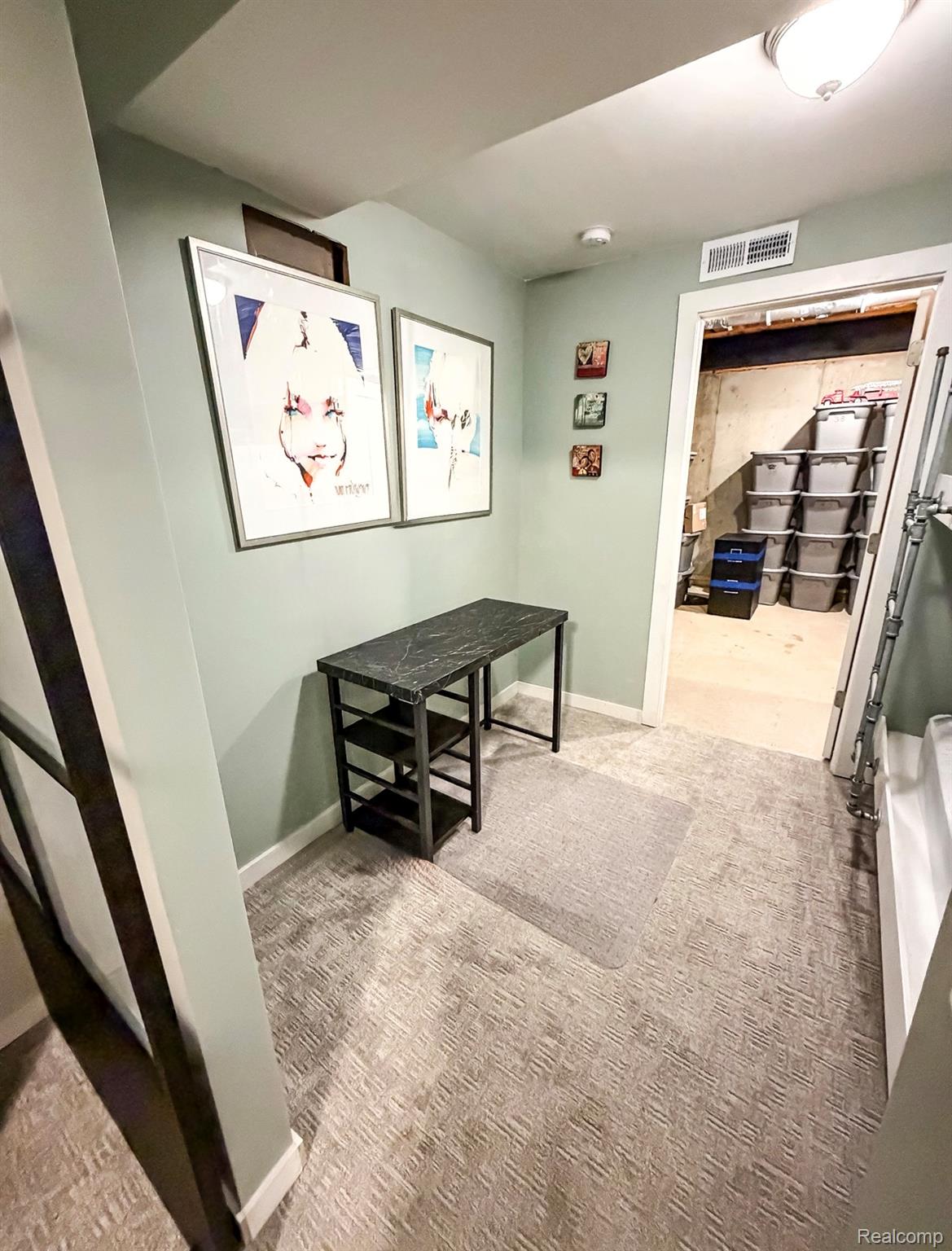 1876 Genoa Circle Howell, MI 48843 - Photo 25 of 36 Basement Bunk Room / Office with light carpet and baseboards