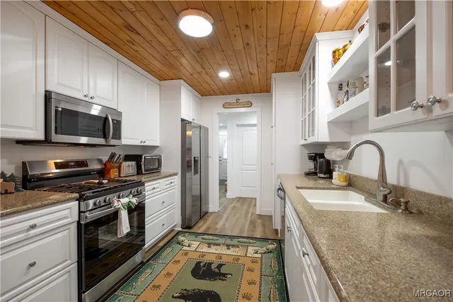 a bedroom with bed and a window