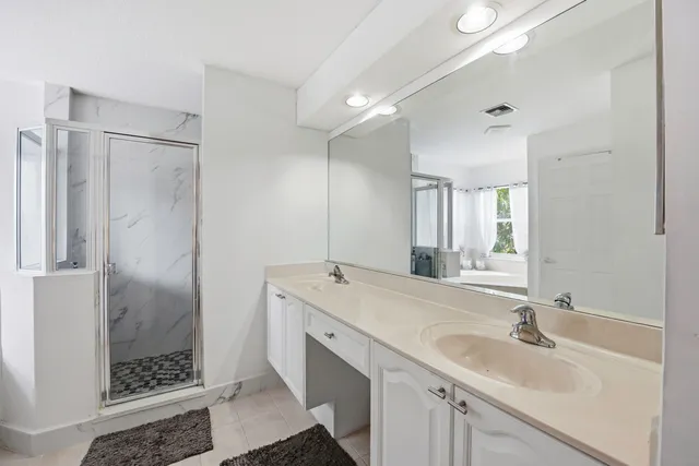 a living room with furniture and a walk in closet