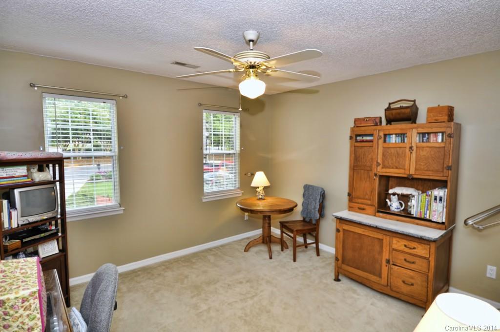 6149 Park Hill Road Charlotte, NC 28277 - Photo 11 of 20 a view of a workspace with furniture and a window