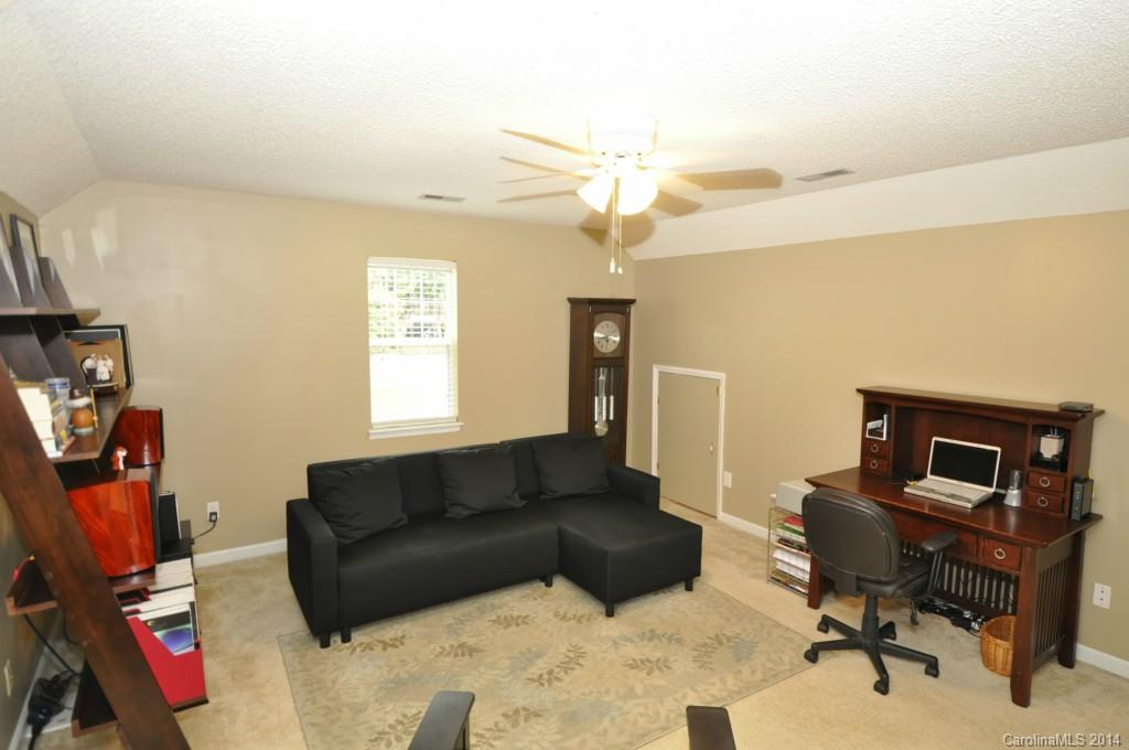 6149 Park Hill Road Charlotte, NC 28277 - Photo 12 of 20 a living room with furniture and a window