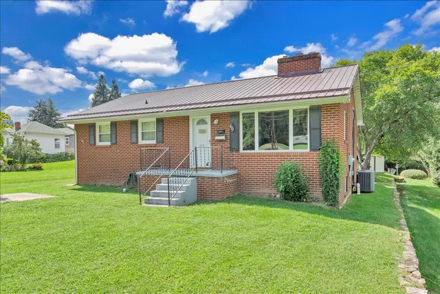 front view of a house with a yard