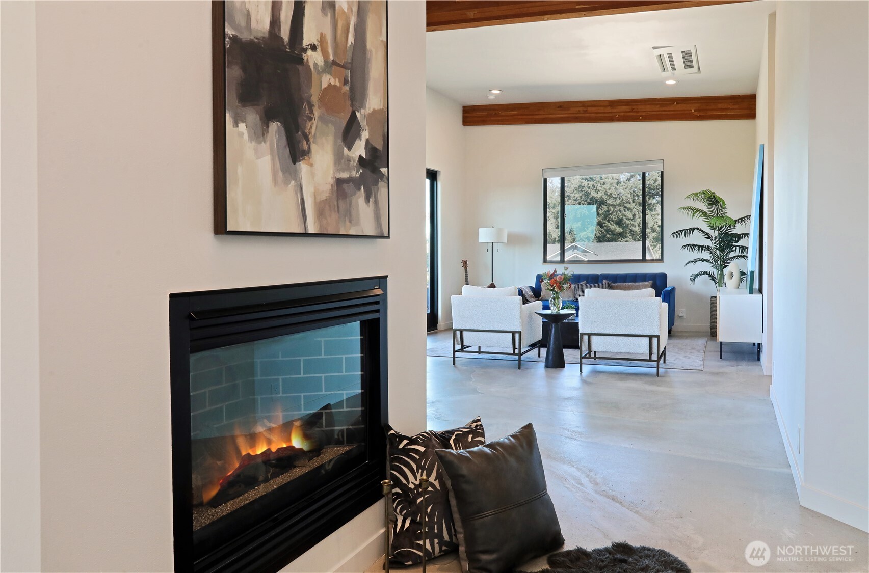 5453 Harborside Lane Freeland, WA 98249 - Photo 11 of 25 a living room with furniture and a fireplace