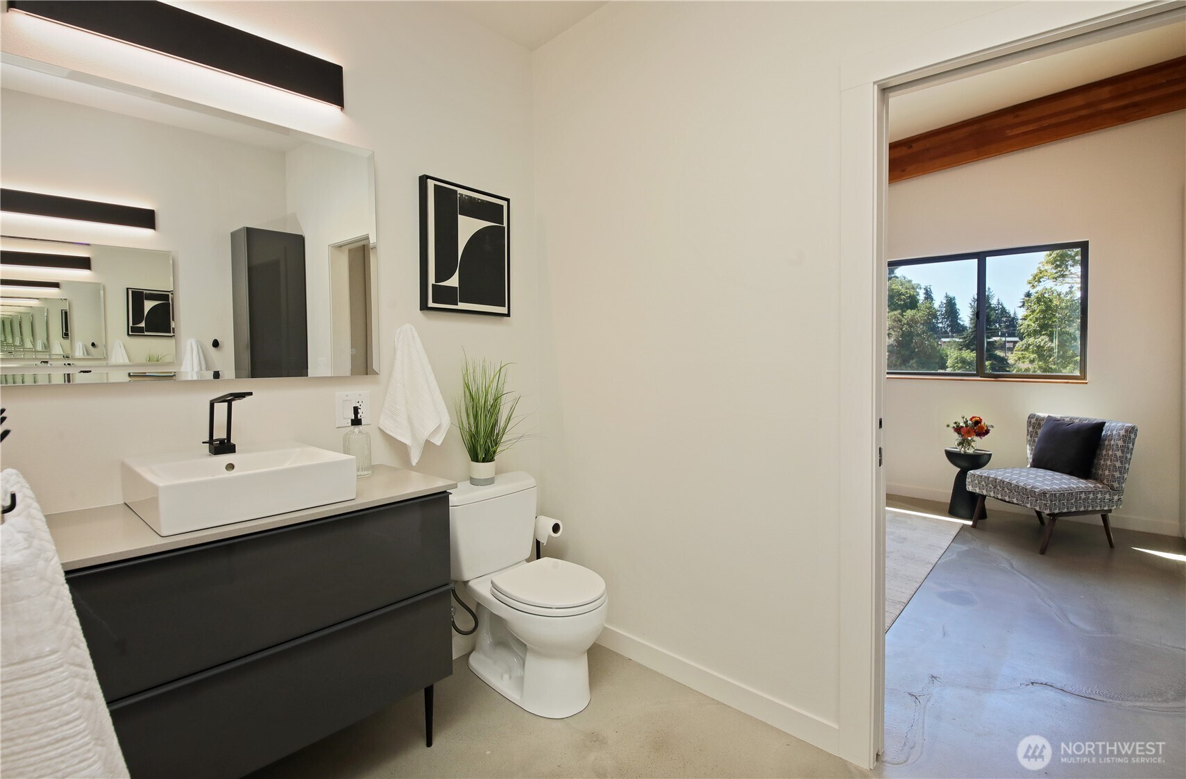 5453 Harborside Lane Freeland, WA 98249 - Photo 12 of 25 a bathroom with a toilet a sink and mirror
