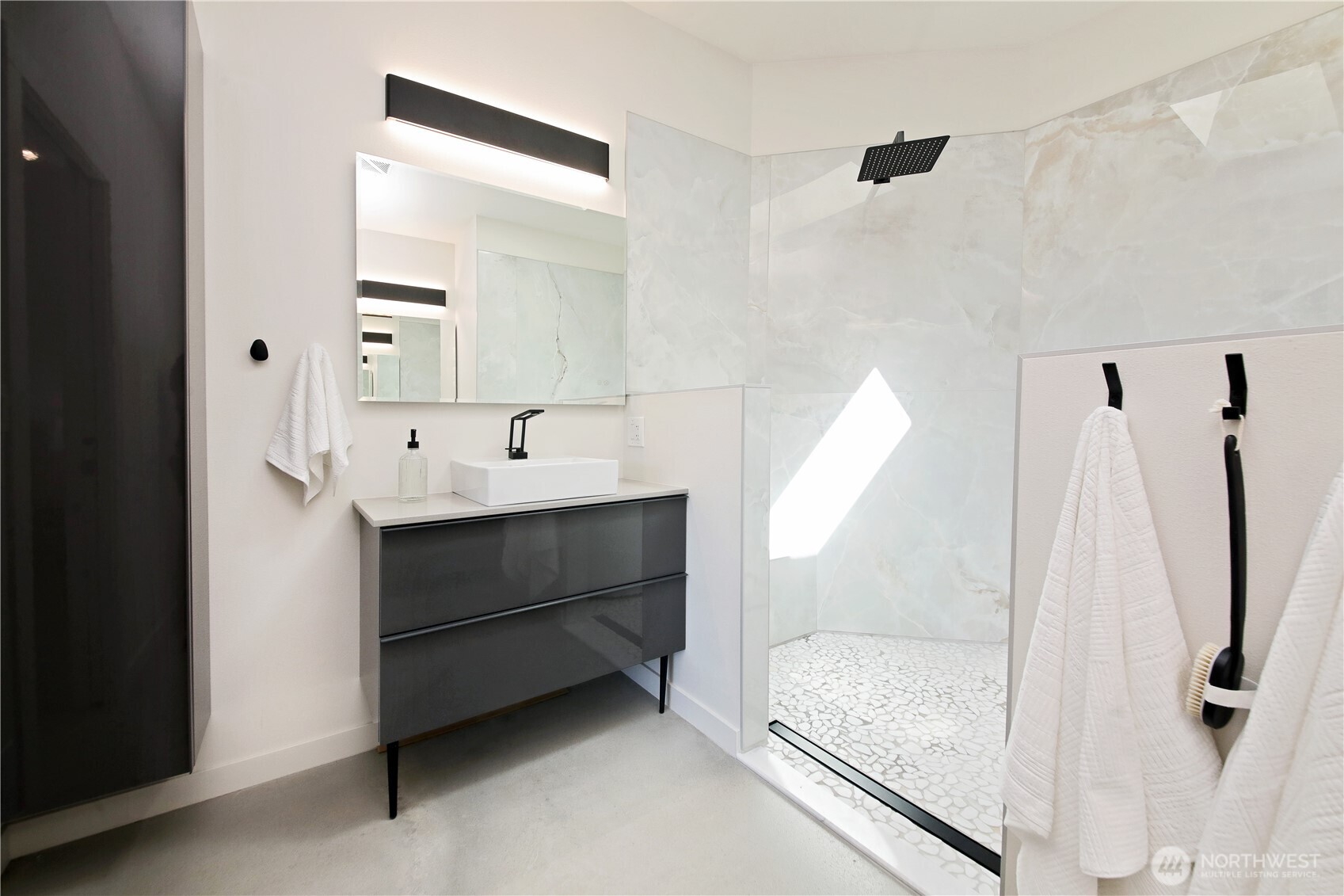 5453 Harborside Lane Freeland, WA 98249 - Photo 14 of 25 a bathroom with a sink and mirror