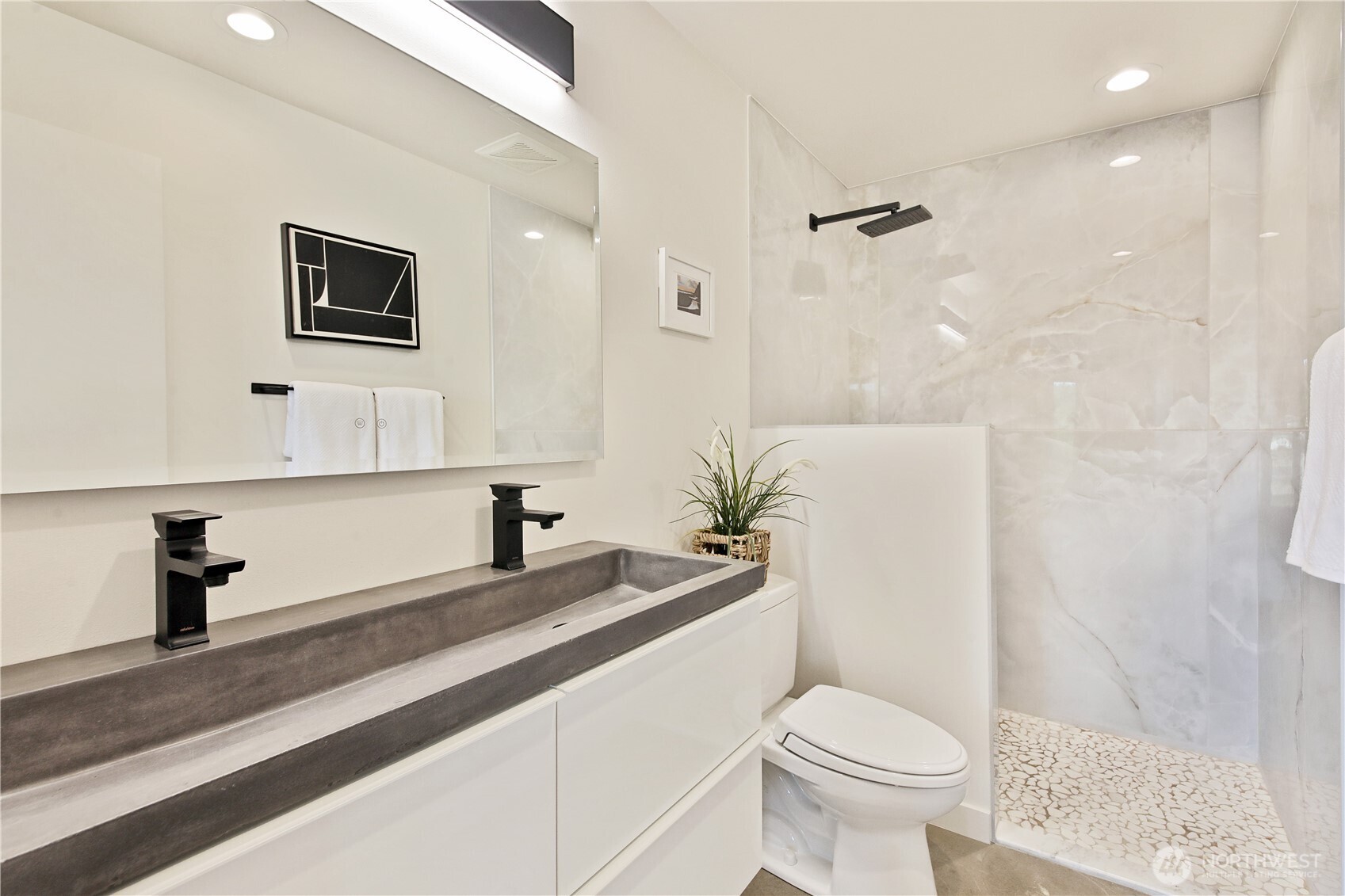 5453 Harborside Lane Freeland, WA 98249 - Photo 20 of 25 a bathroom with a sink a toilet and shower