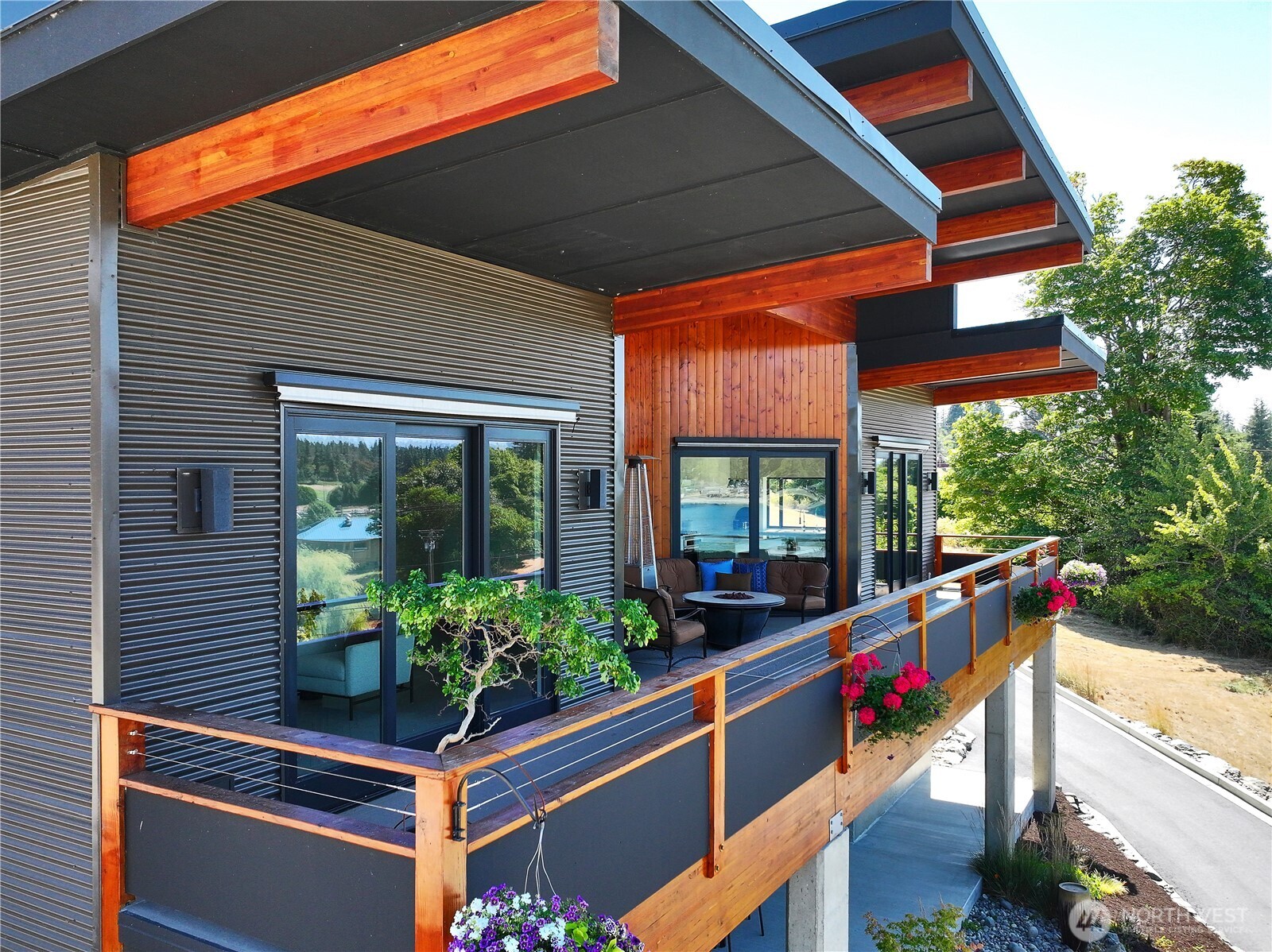 5453 Harborside Lane Freeland, WA 98249 - Photo 2 of 25 a house view with a sitting space and garden space