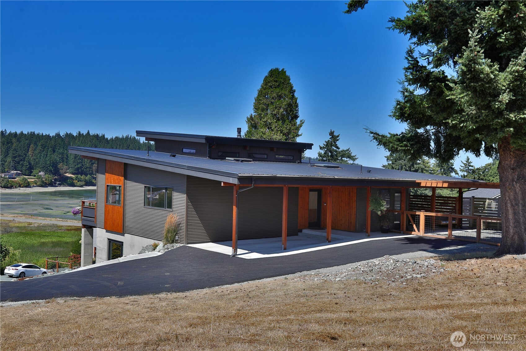5453 Harborside Lane Freeland, WA 98249 - Photo 21 of 25 a front view of a house with a yard