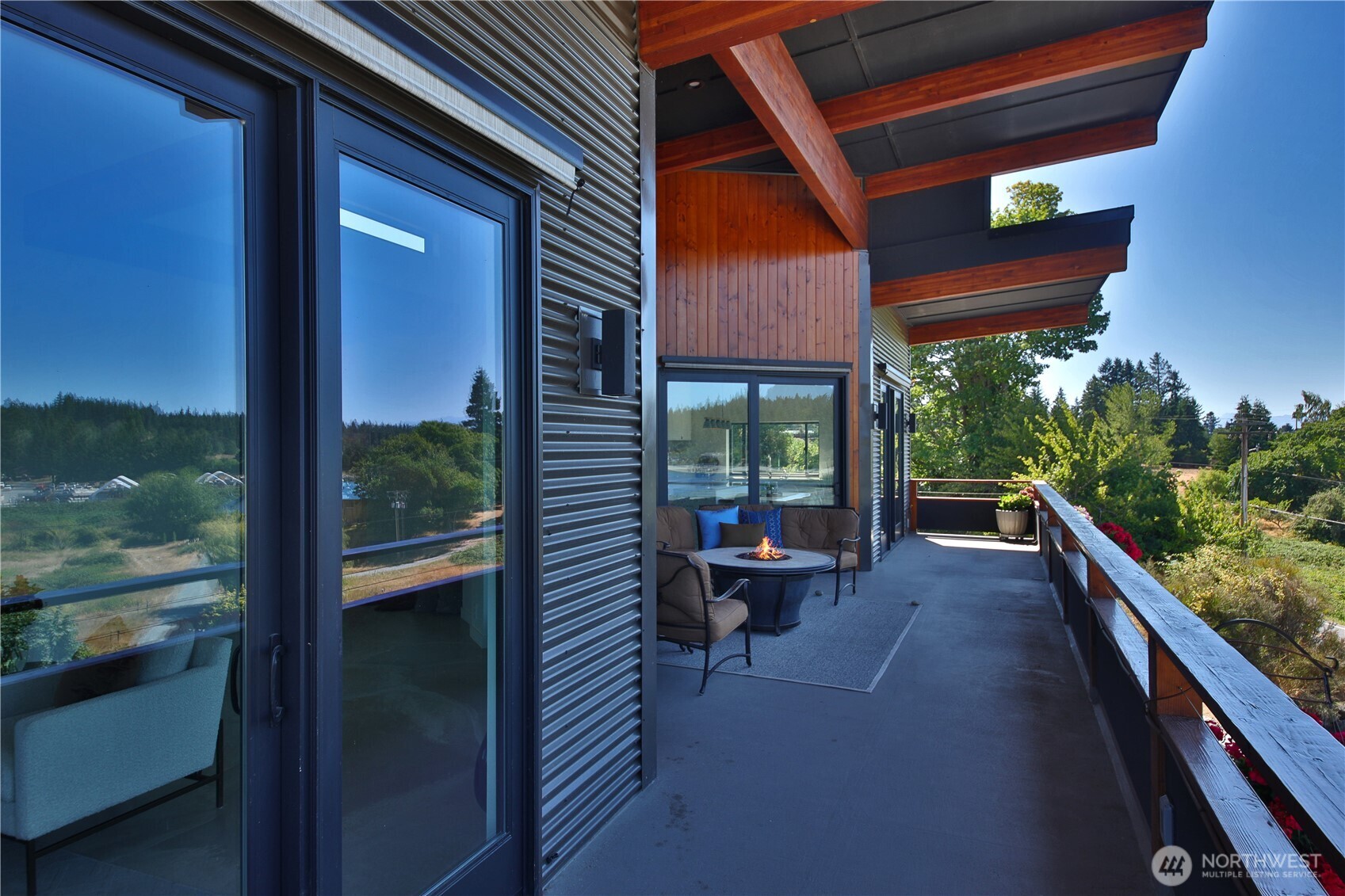 5453 Harborside Lane Freeland, WA 98249 - Photo 3 of 25 a view of balcony with chairs and wooden fence