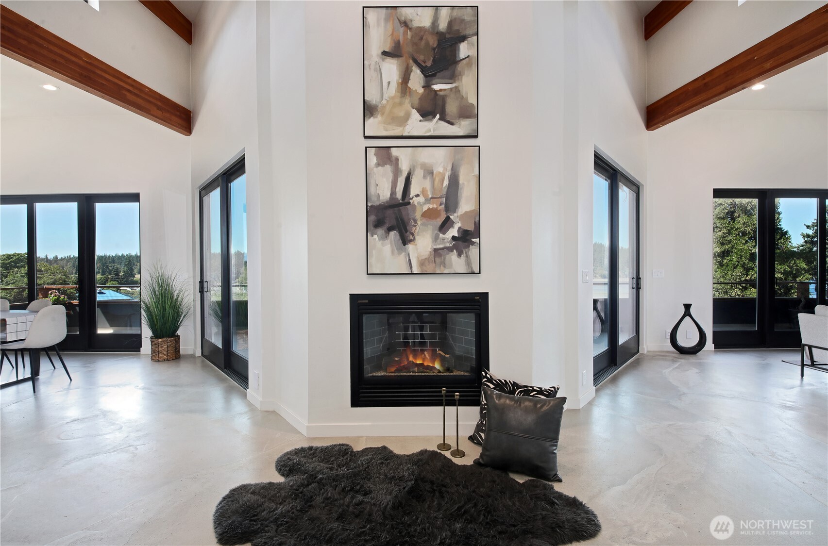 5453 Harborside Lane Freeland, WA 98249 - Photo 5 of 25 a living room with furniture and a fireplace