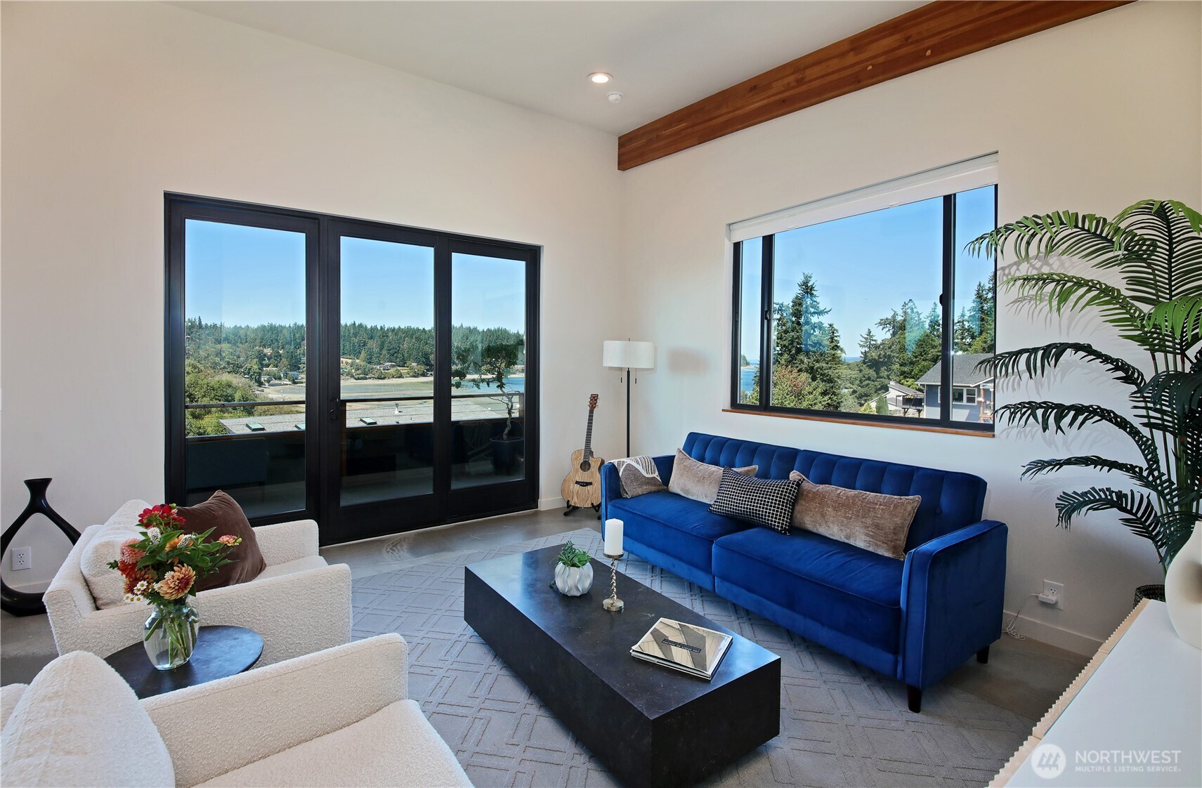 5453 Harborside Lane Freeland, WA 98249 - Photo 6 of 25 a living room with furniture and a large window