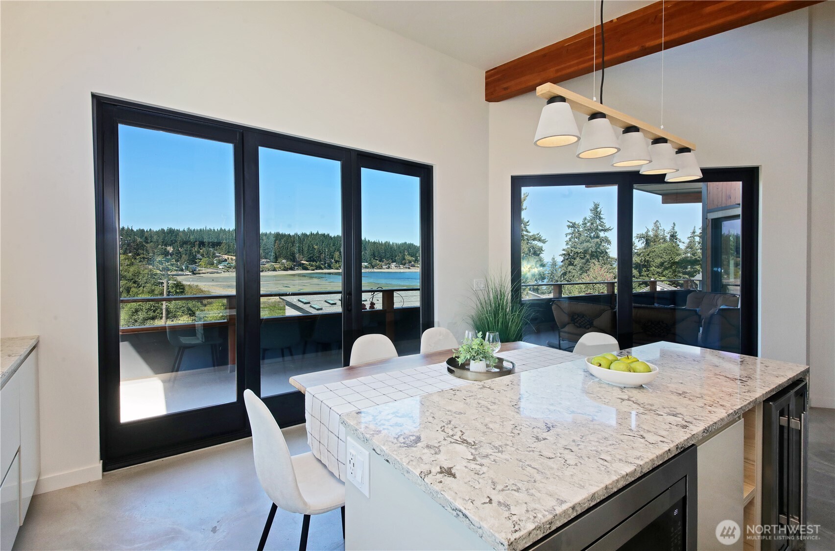 5453 Harborside Lane Freeland, WA 98249 - Photo 9 of 25 a view of a dining room with furniture and window