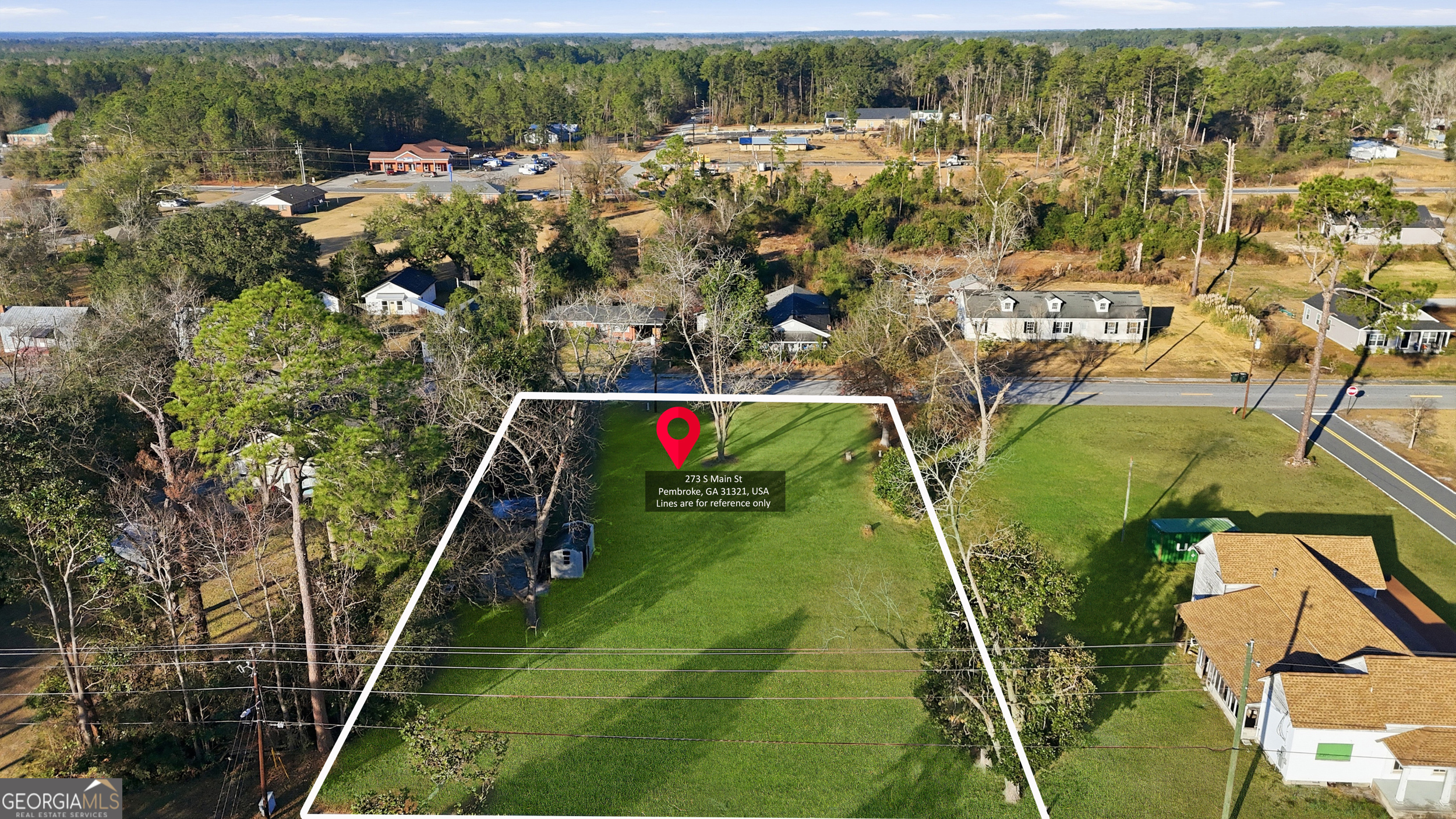 273 South Main Street Pembroke, GA 31321 - Photo 12 of 22 an aerial view of residential houses with outdoor space