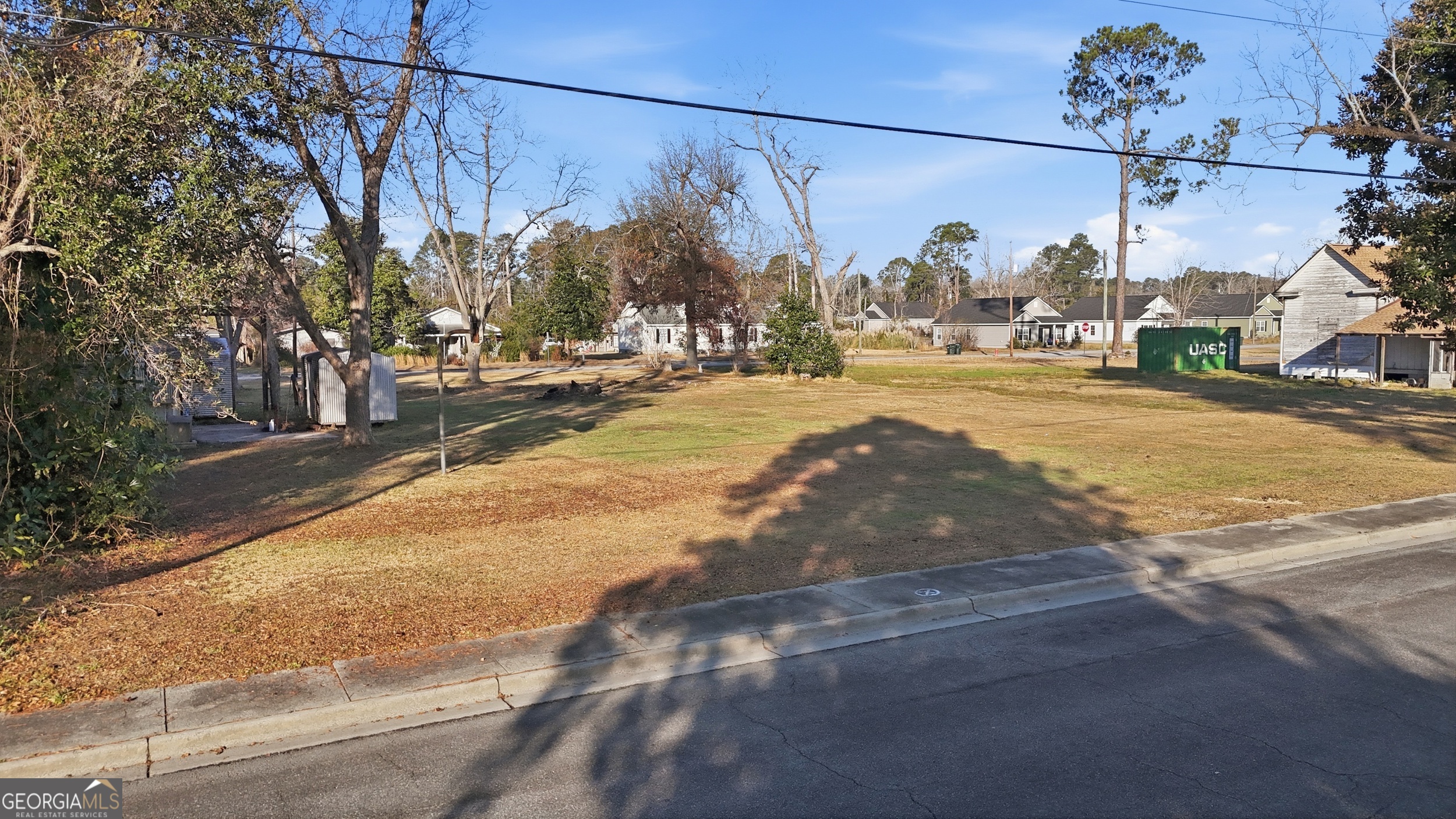 273 South Main Street Pembroke, GA 31321 - Photo 15 of 22 a view of street with cars