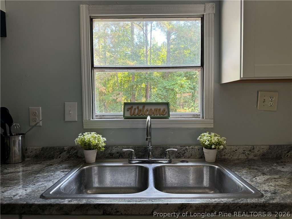511 Inverary Drive Raeford, NC 28376 - Photo 13 of 32 a close view of sink and tap