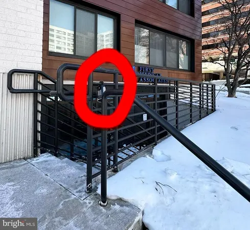 a view of a porch with table and chairs