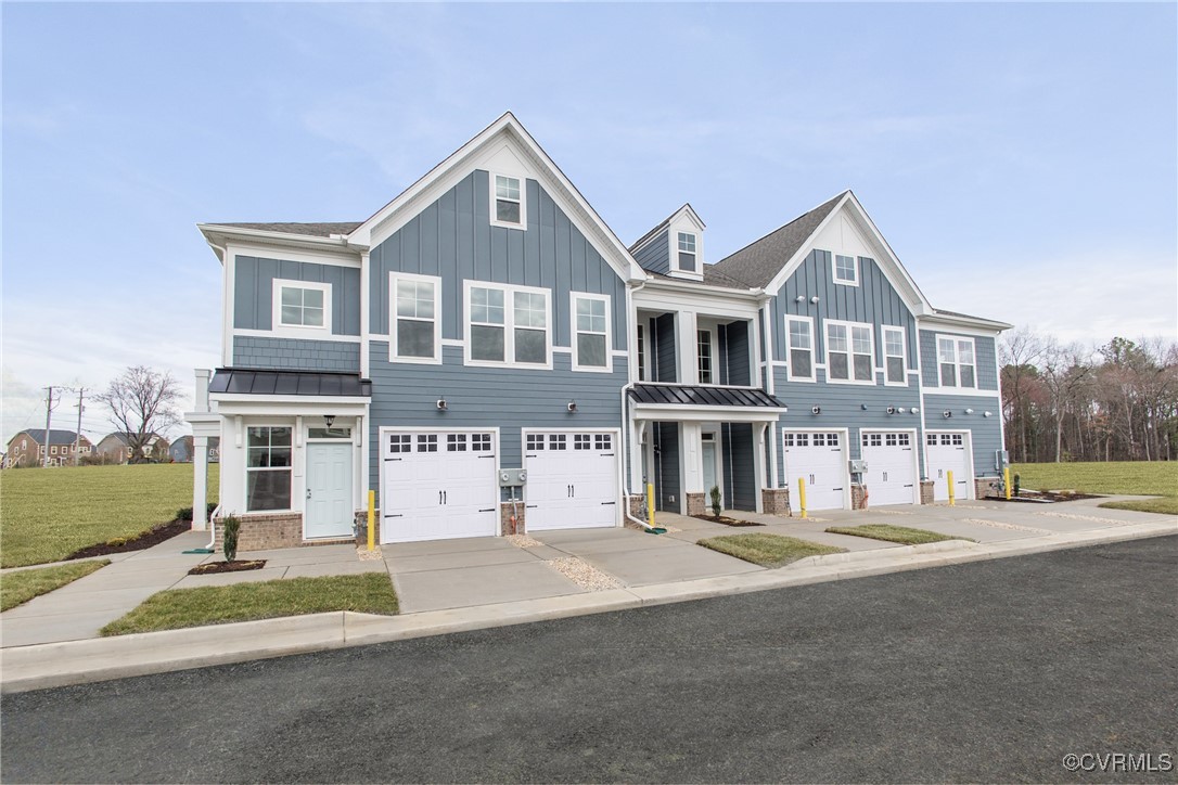 12220 Marsett Court, Unit 201 Glen Allen, VA 23059 - Photo 1 of 38 a front view of a house with a yard